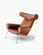 brown leather armchairs